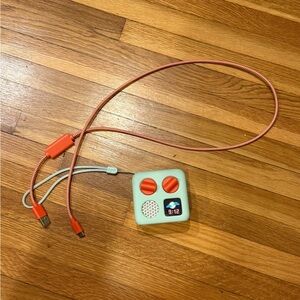 Portable Orange and White Electronic Device